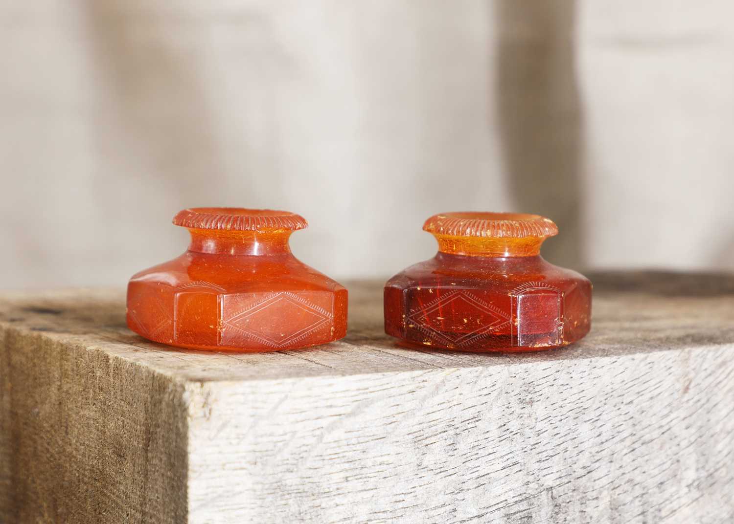 Lot 43 - Two Prussian amber scent bottles