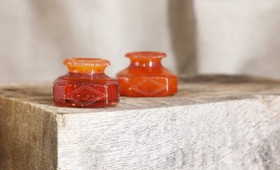 Lot 43 - Two Prussian amber scent bottles