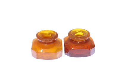 Lot 43 - Two Prussian amber scent bottles