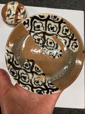 Lot 98 - A collection of thirteen Japanese pottery saucers