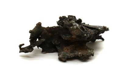 Lot 234 - A melted gun fragment
