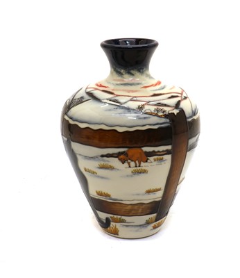 Lot 116 - A Moorcroft pottery 'Who goes there?' pattern vase