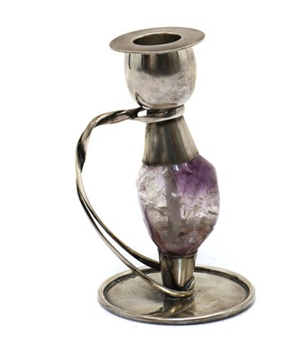 Lot 45 - An Arts & Crafts style silver and amethyst candlestick