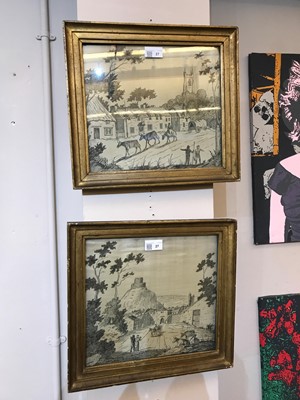 Lot 27 - A pair of black silk work pictures