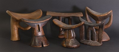 Lot 14 - A collection of six carved Bari headrests