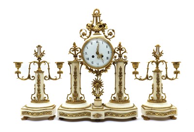 Lot 172 - A gilt metal and faux white marble clock portico clock garniture