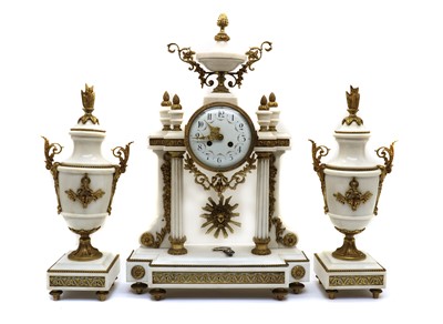 Lot 168 - A gilt metal and faux white marble clock portico clock garniture