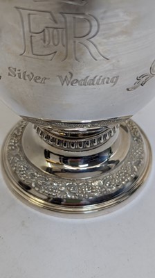 Lot 50 - A commemorative silver claret jug