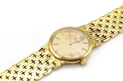 Lot 479 - A ladies' 18ct gold Rolex mechanical bracelet watch