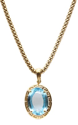 Lot 281 - A gold single stone blue topaz pendant