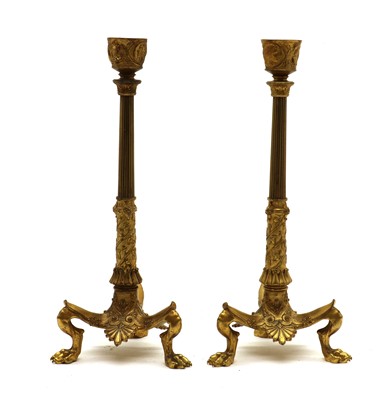 Lot 279 - A pair of Empire style gilt bronze candlesticks