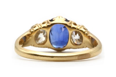 Lot 13 - A gold sapphire and diamond three stone ring