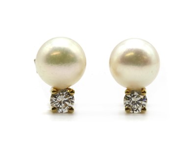 Lot 337 - A pair of gold cultured pearl and diamond earrings