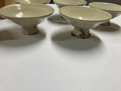 Lot 105 - A collection of five Japanese white-glazed stem bowls
