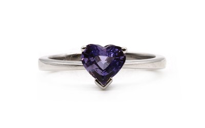Lot 301 - An 18ct white gold single stone purple sapphire ring