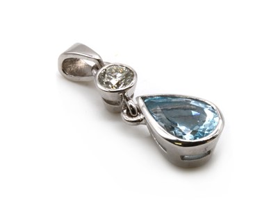 Lot 276 - A white gold aquamarine and diamond pendant