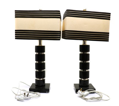 Lot 177 - A pair of 1970s black and chrome table lamps