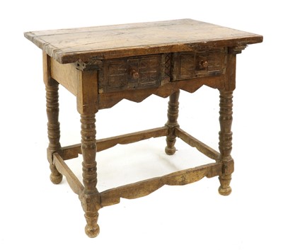 Lot 464 - A Continental fruitwood two drawer side table