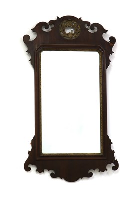 Lot 236 - A George III mahogany fret carved wall mirror