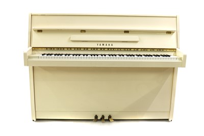 Lot 253 - A Yamaha model M110N white lacquered upright piano