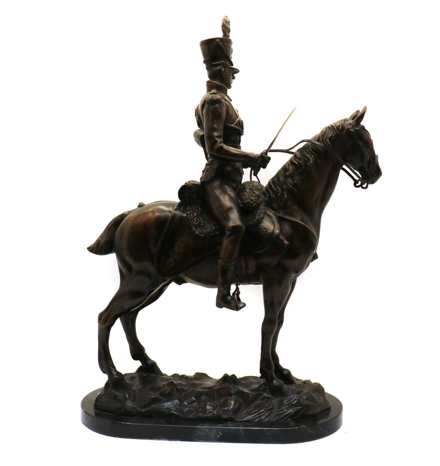 Lot 148 - A bronze figure of a French Cavalry Hussar