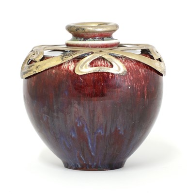 Lot 20 - An Art Nouveau sang-de-boeuf glazed vase