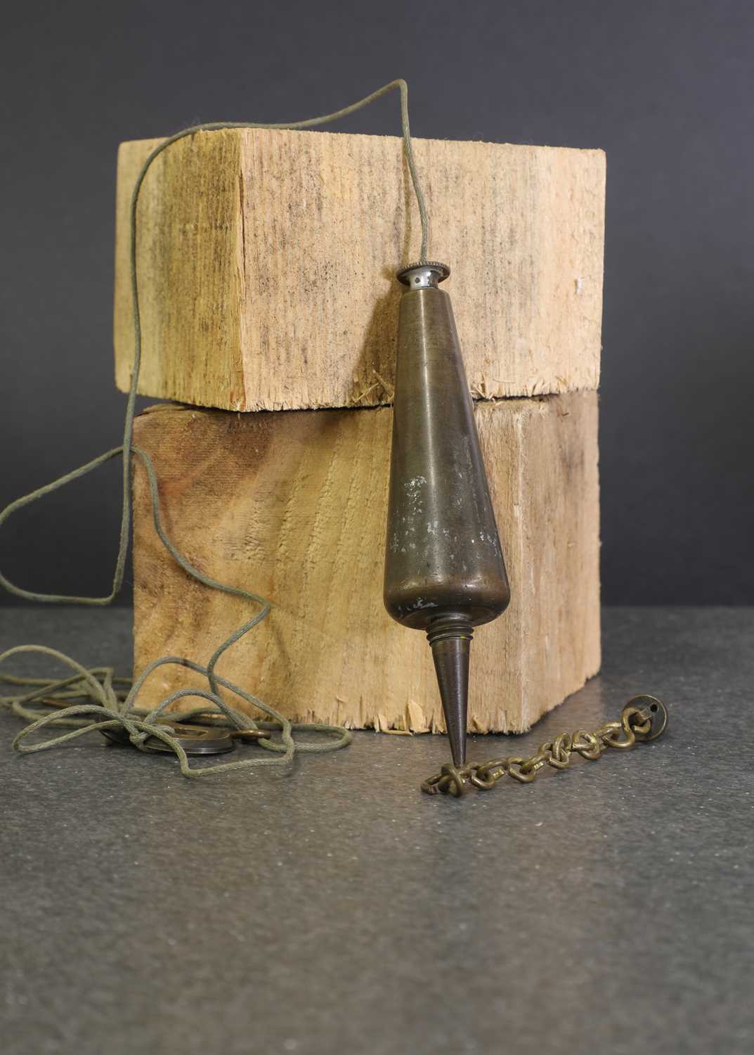 Lot 20 - Of architectural interest: a cast brass Victorian plumb line