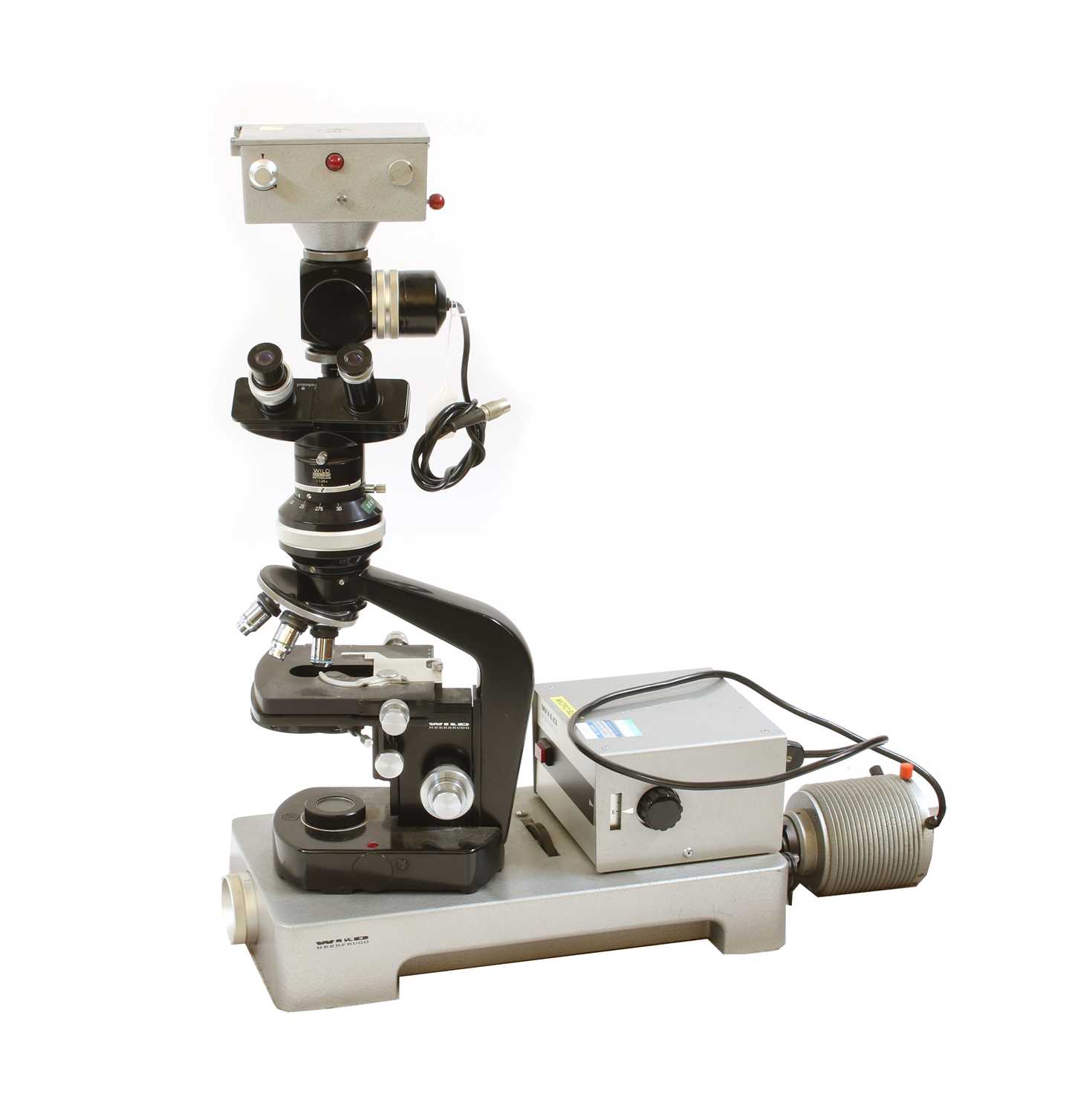 Lot 176 - A Wild Heerbrugg Ltd. M20 microscope and accessories