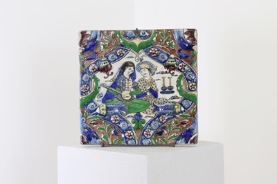 Lot 59 - A Qajar-style pottery tile
