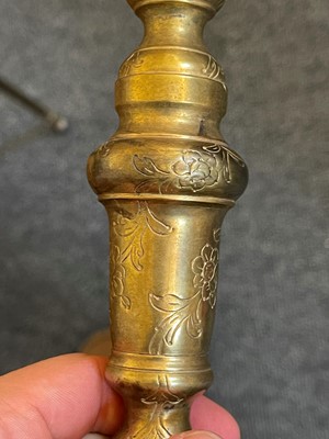 Lot 60 - Two gilt-brass candlesticks
