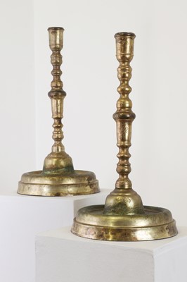 Lot 60 - Two gilt-brass candlesticks