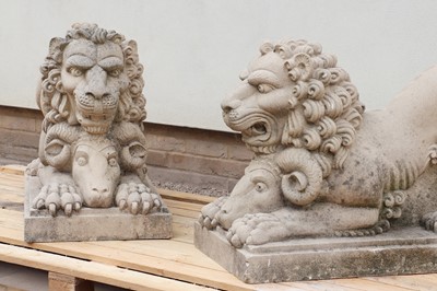 Lot 490 - A pair of composite stone lions