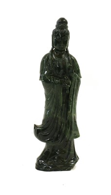 Lot 143 - A nephrite or green quartz figure of Guanyin