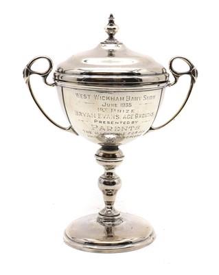 Lot 9 - A silver presentation cup and cover