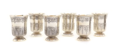 Lot 25 - A set of six Odiot silver beakers