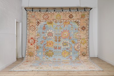 Lot A large Oushak wool carpet