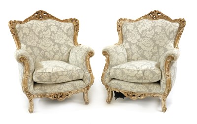 Lot 416 - A pair of French style armchairs