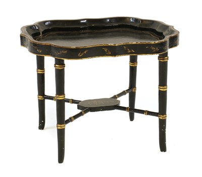 Lot 456 - A black lacquer chinoiserie occasional table