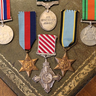 Lot 152 - A WWII AFC medal group awarded to Squadron Leader Brian H. Moloney