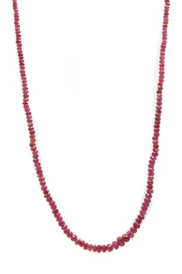 Lot 165 - A single row graduated faceted ruby bead necklace