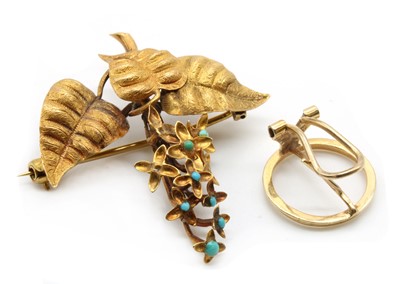 Lot 395 - A gold turquoise set brooch