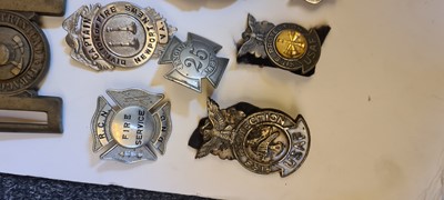 Lot 173 - A collection of four fire service caps