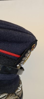 Lot 173 - A collection of four fire service caps