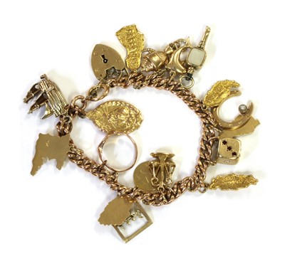 Lot 430 - A gold charm bracelet