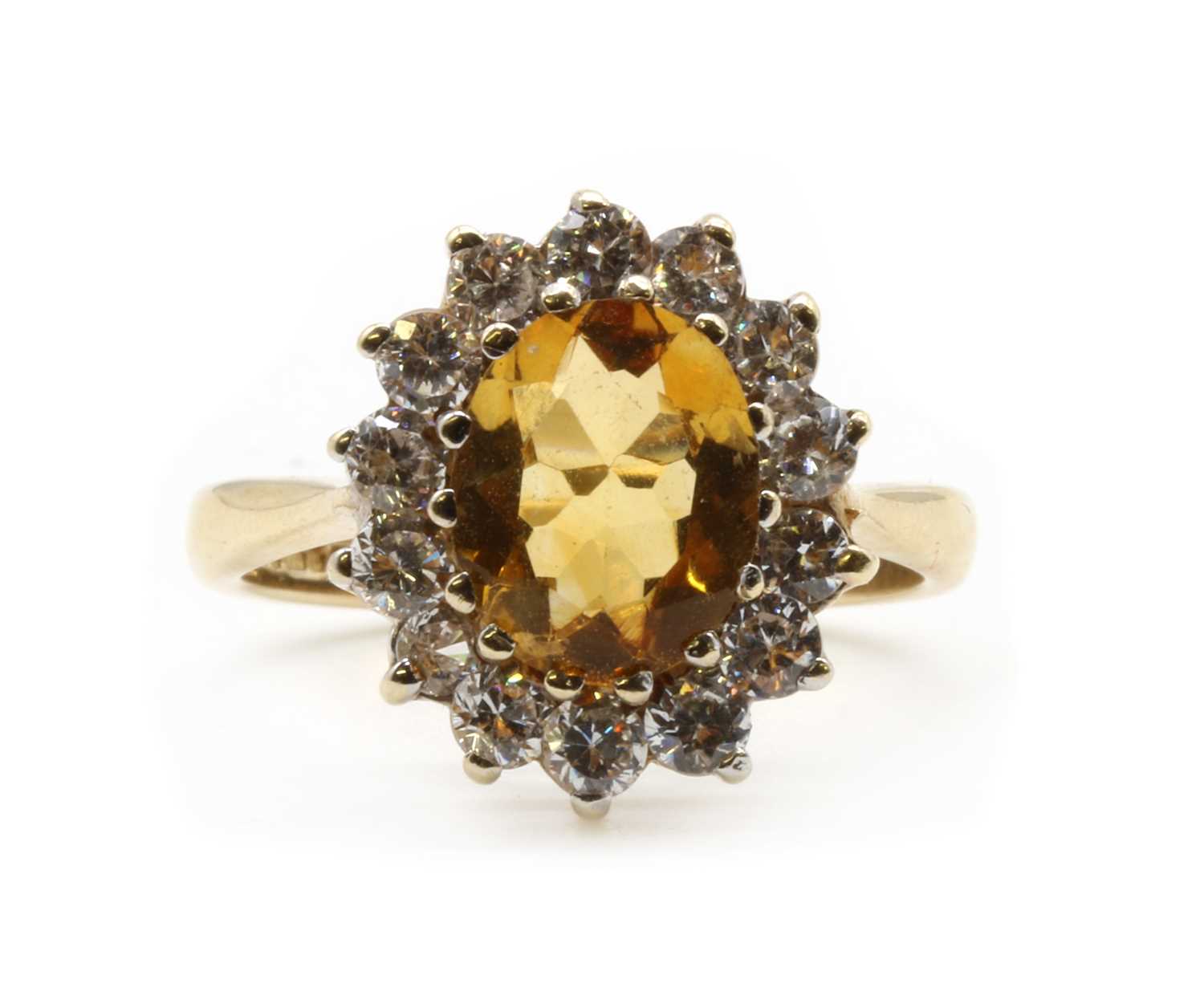 Lot 195 - A 9ct gold citrine and cubic zirconia cluster ring