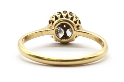 Lot 57 - A gold diamond cluster ring