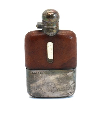 Lot 16 - A silver, leather and glass hip flask