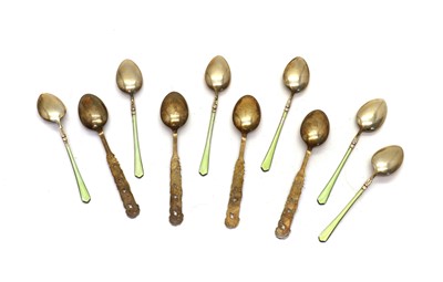 Lot 24 - A group of four Norwegian silver gilt and enamel spoons