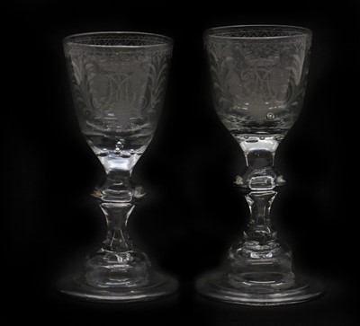 Lot 116 - A pair of engraved wine glasses