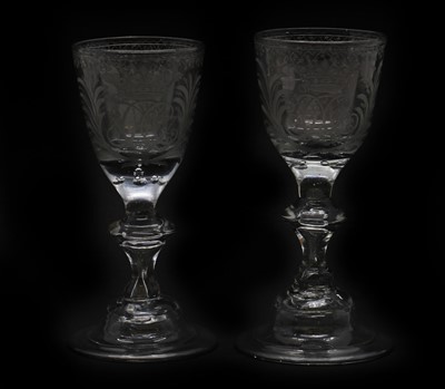 Lot 116 - A pair of engraved wine glasses